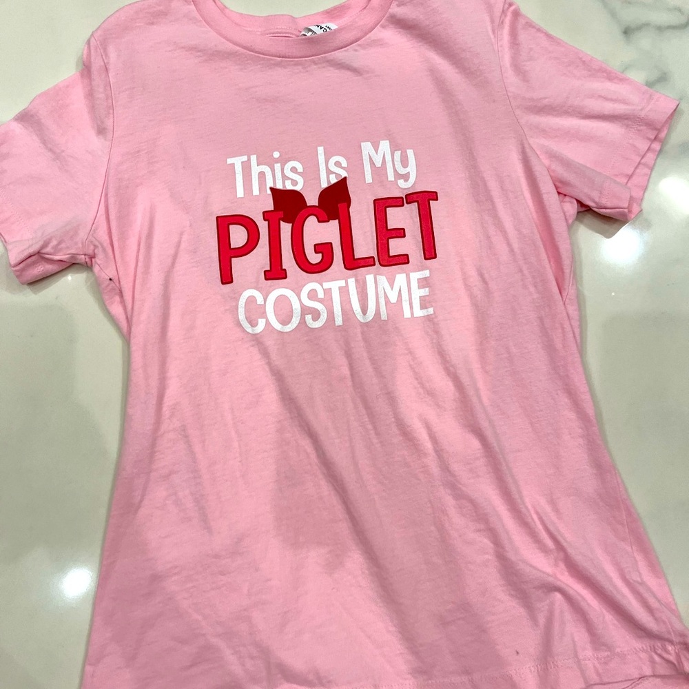 Pink shirt with “this is my Piglet costume” imprinted on it!